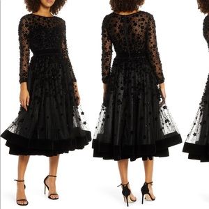 Mac Duggal Black evening A line gown . Size 12 Worn twice . Dry cleaned